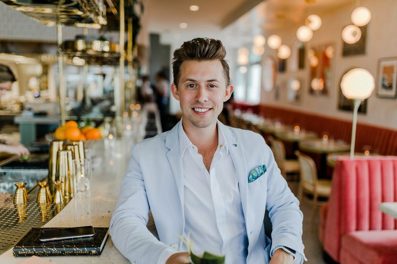 Professional brand representative in a blazer smiling